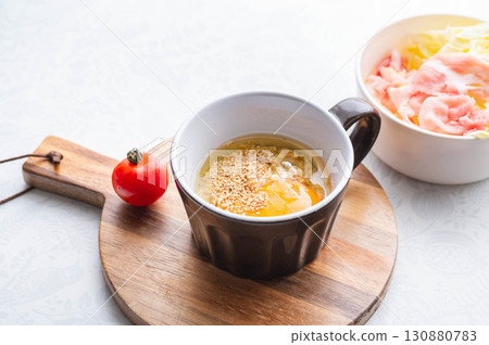 Oatmeal rice with egg and Japanese dashi 130880783