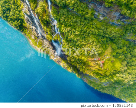 Nature in the Geiranger Fjord, Norway. Traveling by boat on a Norwegian fjord. Scandinavia. Nature in the Geiranger Fjord, Norway. Traveling by boat on a Norwegian fjord. Scandinavia. 130881148