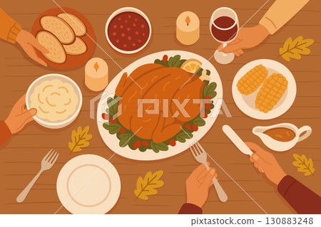 Family dinner table with Thanksgiving turkey, side dishes and candles in warm autumn colors 130883248