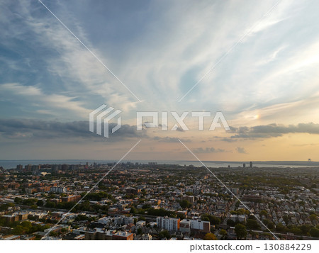 he cityscape appears densely populated with buildings 130884229