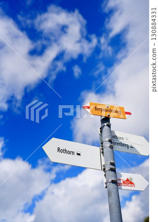 Rothorn summit sign and blue sky A popular Swiss scenic spot for climbers Rothorn summit sign and blue sky A popular Swiss scenic spot for climbers 130884331
