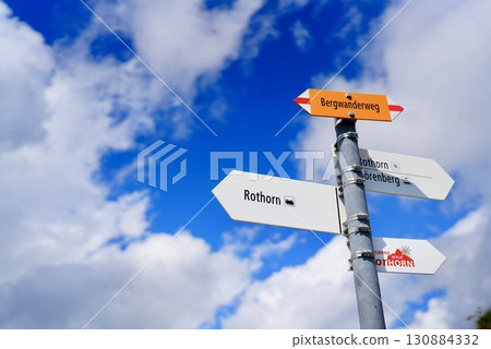 Rothorn summit sign and blue sky A popular Swiss scenic spot for climbers 130884332