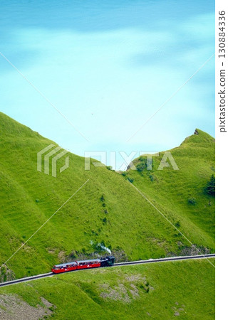 The Brienz Railway climbing the Alps A trip to Switzerland full of stunning views and natural beauty 130884336