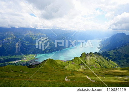 Spectacular view of Lake Brienz from the top of the Rothorn. The natural beauty of the Alps and the lake. 130884339