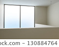 Empty room interior view of house renovation and construction project detail showing calm and minimalist space with large window and white wall architecture 130884764