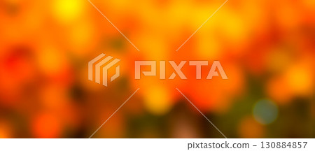 abstract blurred autumn landscape with orange and yellow bokeh, a beautiful out of focus background for seasonal creative design 130884857