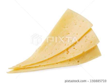 Pieces of cheese triangle close-up on a white. Isolated Pieces of cheese triangle close-up on a white. Isolated 130885710