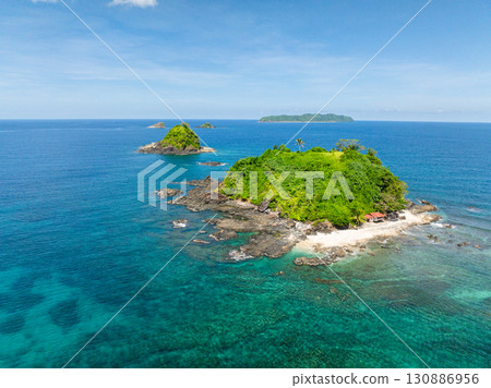 Bolog Islands surrounded by clear turquoise waters. El Nido, Palawan. Philippines. Bolog Islands surrounded by clear turquoise waters. El Nido, Palawan. Philippines. 130886956