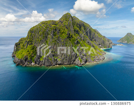 Blue sea in Tapiutan Island. Blue sky clouds. El Nido, Philippines. 130886975