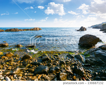 pebble coast in the morning. beautiful summer vacation season at the black sea 130887132