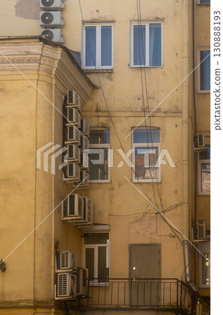 Air conditioners on the facade of the house, ventilation and cooling system. Air conditioners on the facade of the house, ventilation and cooling system. 130888193