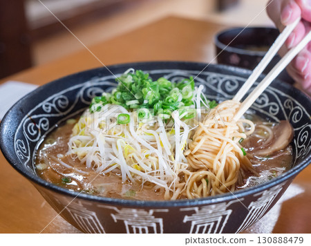 Tonkotsu soy sauce ramen with plenty of green onions and bean sprouts. Tonkotsu soy sauce ramen with plenty of green onions and bean sprouts. 130888479