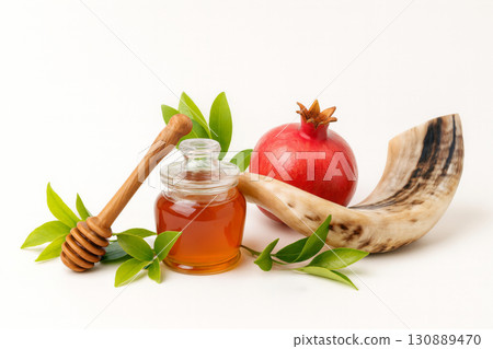 Rosh Hashanah, central festival in t Jewish religious Holiday is traditionally represented by symbols of apples, honey, pomegranates, shofar. Rosh Hashanah, central festival in t Jewish religious Holiday is traditionally represented by symbols of apples, honey, pomegranates, shofar. 130889470