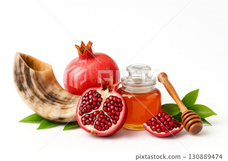 Rosh Hashanah, solemn observance of Jewish Holiday New Year, is marked by traditional symbols such as apples, honey, pomegranates, shofar. 130889474
