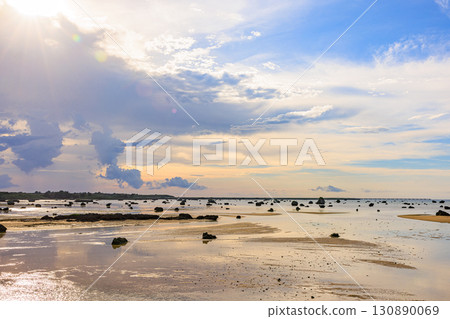 Afternoon view of Sawada Beach (Miyako Island, Irabu Island) with countless huge rocks Afternoon view of Sawada Beach (Miyako Island, Irabu Island) with countless huge rocks 130890069