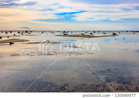 Afternoon view of Sawada Beach (Miyako Island, Irabu Island) with countless huge rocks 130890077
