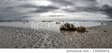 Abandoned Sand Beach With Boulders And Sandworm Piles On Andoya Island Of Lofoten In Norway 130890858