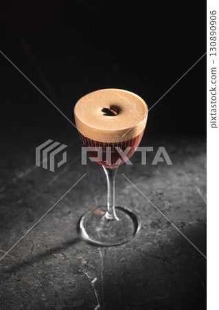 Espresso martini cocktail in elegant glass 130890906