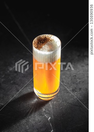 Highball sour cocktail with foam and spices 130890936