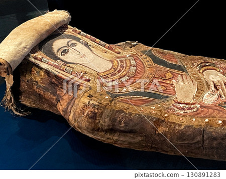 Coffins and mummy shrouds on display at the Grand Egyptian Museum in Giza 130891283