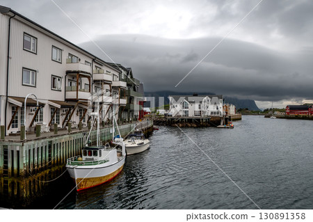 Harbor With Fisher Boats In Henningsvaer City On Lofoten Islands In Norway Harbor With Fisher Boats In Henningsvaer City On Lofoten Islands In Norway 130891358