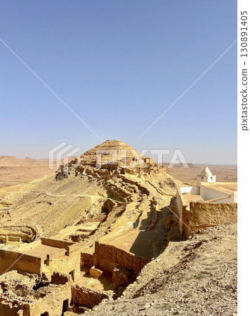 Exploring the troglodyte village of Qirmisah in Tataouine, Tunisia, showcasing unique architecture 130891405