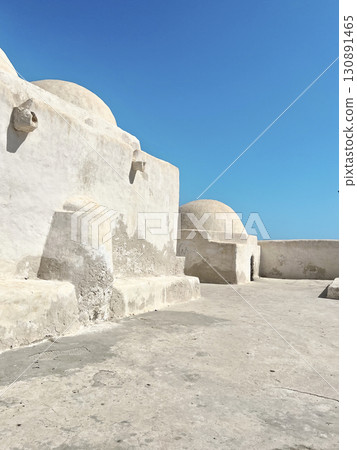 Historic architecture of Sidi Yeti Mosque in Guellala, Djerba with a clear blue sky Historic architecture of Sidi Yeti Mosque in Guellala, Djerba with a clear blue sky 130891465