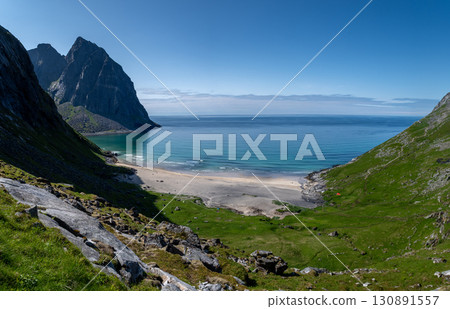 Kvalvika Sand Beach With Mountains And Ocean On Lofoten Islands In Norway 130891557