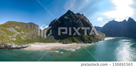 Kvalvika Sand Beach With Mountains And Ocean On Lofoten Islands In Norway 130891563
