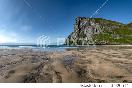 Kvalvika Sand Beach With Mountains And Ocean On Lofoten Islands In Norway 130891565