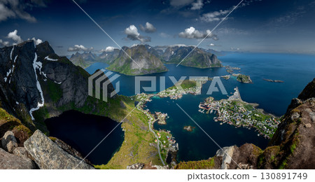 Spectacular Viewing Point Reinebringen Over Coastal Landscape At Reine And Hamnoy On Lofoten Islands In Norway 130891749