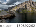 Coastal Hut At A Calm Fjord In Nusfjord On Lofoten Islands In Norway 130892262