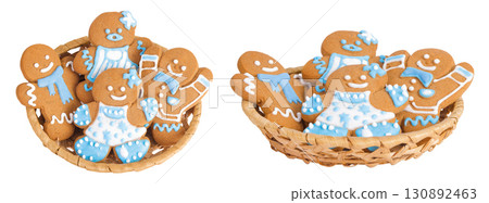 christmas gingerbread cookie in a wicker basket isolated on white background 130892463