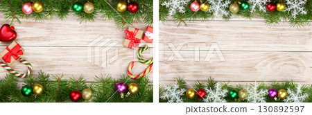 Christmas frame made of fir branches decorated with balls, candy canes and boxes on a light wooden background Christmas frame made of fir branches decorated with balls, candy canes and boxes on a light wooden background 130892597