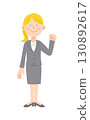 Caucasian female employee pumping her fist 130892617