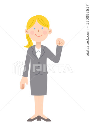 Caucasian female employee pumping her fist Caucasian female employee pumping her fist 130892617