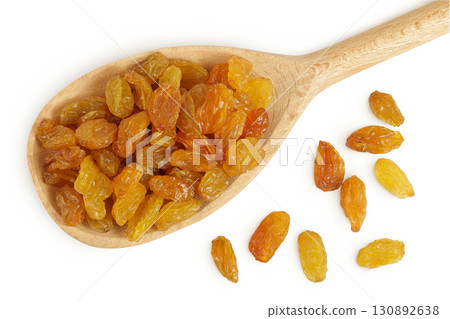 Yellow Raisins in wooden spoon isolated on white background. Top view. Flat lay, 130892638