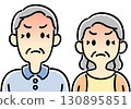 The upper body of an angry senior couple 130895851