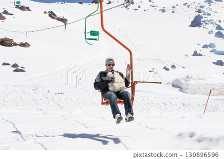 Male tourist on a old funicular. Russia's North Caucasus. Elbrus mountain 130896596