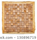 Wooden mosaic artwork showcases a blend of textures and colors in natural tones. 130896719
