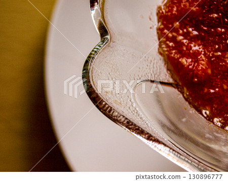 Composition with dessert and glass vase 130896777