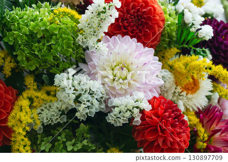 Colorful autumn blossoms create a beautiful bouquet perfect for fall celebrations Colorful autumn blossoms create a beautiful bouquet perfect for fall celebrations 130897709
