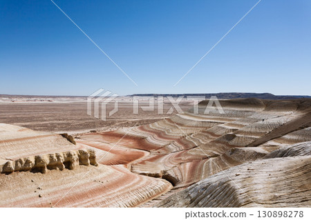 Kyzylkup plateau landscape, Mangystau desert. Rock strata formations Kyzylkup plateau landscape, Mangystau desert. Rock strata formations 130898278