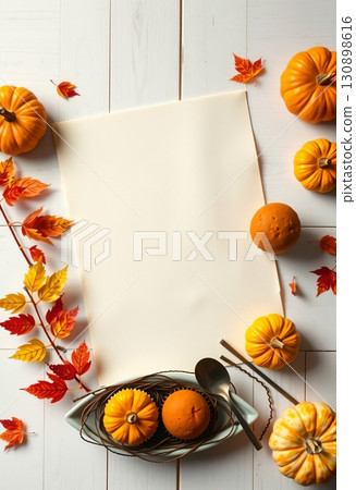 Natural pumpkins and leaves on bright wooden festive background Natural pumpkins and leaves on bright wooden festive background 130898616