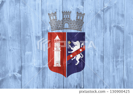 Official flag of the capital of Albania, Tirana, on wood texture. Conceptual collage Official flag of the capital of Albania, Tirana, on wood texture. Conceptual collage 130900425