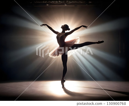 Silhouette of ballerina in graceful dance pose with glowing spotlight, cinematic elegant stage scene Silhouette of ballerina in graceful dance pose with glowing spotlight, cinematic elegant stage scene 130900768