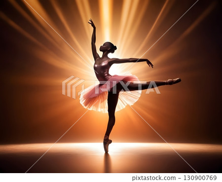 Silhouette of ballerina in graceful dance pose with glowing spotlight, cinematic elegant stage scene 130900769