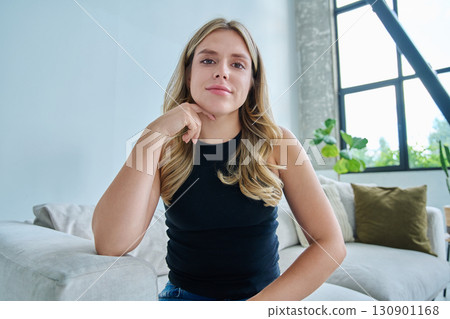 Web cam view of young woman talking looking in camera, online meeting, video call Web cam view of young woman talking looking in camera, online meeting, video call 130901168