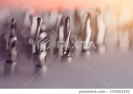Full set of dental implant drill bits in surgical tray, close-up of professional dentistry equipment 130902492
