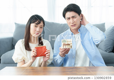 Couples suffering from housing loans 130902859